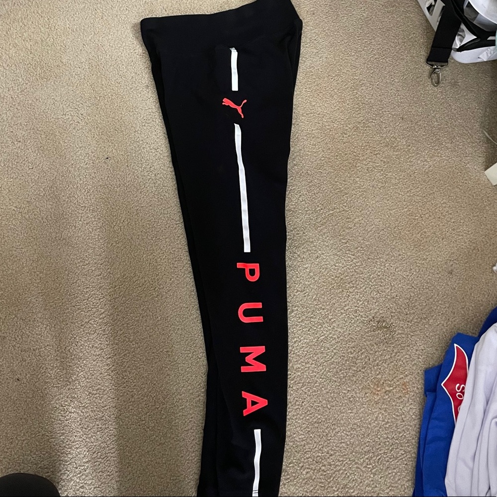 black puma leggings .